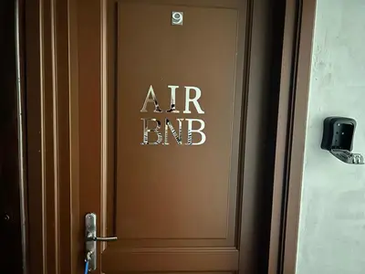 an elevator door with the words art end on it at Old Town - Traugutta Street flat 9 in Kraków
