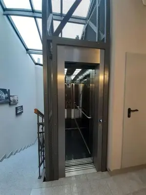 a hallway with a door in a building at Loft Apartment Old Town - G47 in Kraków