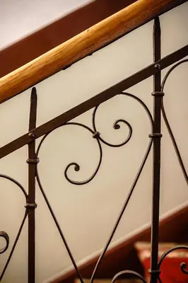 a close up of a metal rail of a bed at Air-conditioned attic apartment Old Town Main Railway Station in Kraków