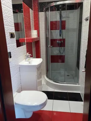a bathroom with a toilet and a shower and a sink at Willa Babia Góra in Zawoja