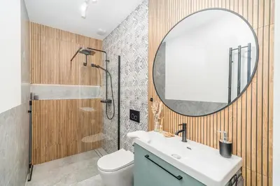a bathroom with a sink and a mirror at Kraków Główny Apt - Top Location, Park&Tram nearby - by Rentujemy in Kraków