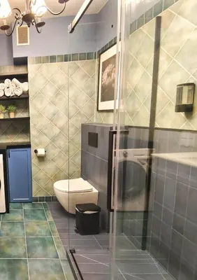 a bathroom with a toilet and a sink and a shower at Bronowicka Comfort Apartment in Kraków