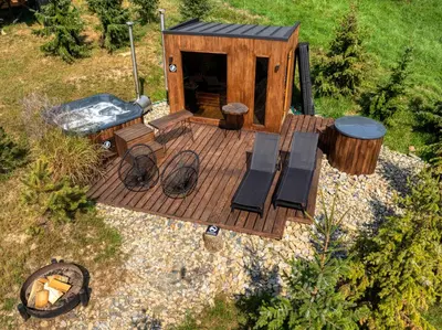 an aerial view of a deck with a hot tub at Black Deer - z Sauną na Tarasie, Jacuzzi i Widokiem na Góry - by Deer Hills Luxury Apartments in Kocoń