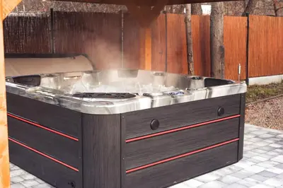 a stove top oven sitting on a patio at Beskidia - Noclegi w Beskidach in Roczyny