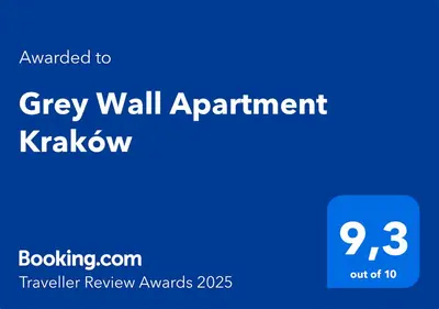 a blue sign with the words grey wall appointment krakatown at Grey Wall Apartment Kraków in Kraków