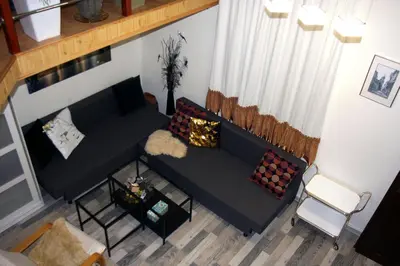 an overhead view of a living room with a couch at Apartment San Sebastian, City Center in Kraków