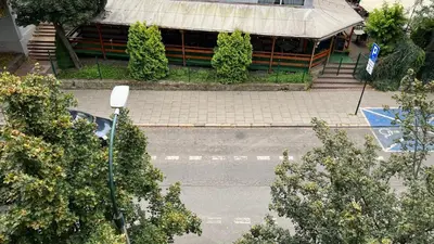 an overhead view of a street with a building at P&J Apartments Koletek in Kraków
