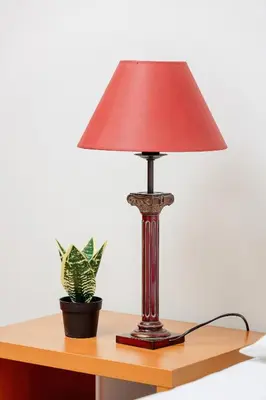 a lamp sitting on a table with a potted plant at Przestronny Apartament w Krakowie z Biurkiem, Parkingiem i Wanną by Noclegi Renters in Kraków