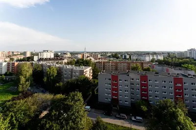an aerial view of a city with tall buildings at Park Zakrzówek Spacious Apartment by BookingHost in Kraków