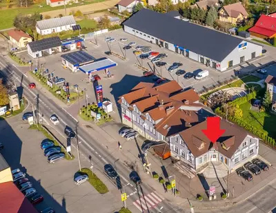 an overhead view of a town with a parking lot at Apartamenty Czerwona Róża in Wieprz