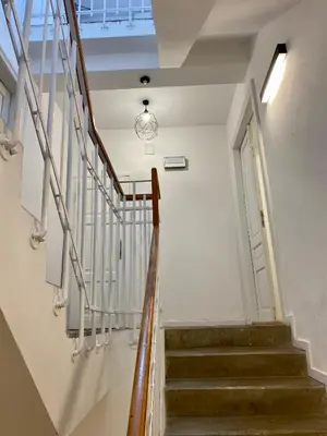 a staircase in a house with a skylight at Charming Loft in the Old Town in Kraków