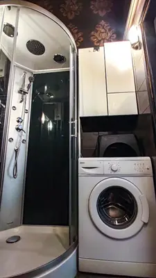 a washer and dryer in an rv at Sweet Home Apartament in Kraków