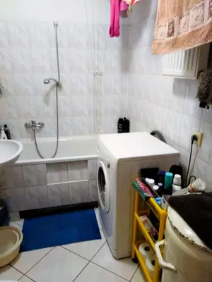 a bathroom with a sink and a tub and a shower at Słoneczny Pokój w bloku na 1 p dla 1 Niepalącej Osoby od 1 do 12 miesięcy in Kraków