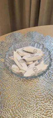 a glass plate with toothbrushes on a table at Apartament Zabawa in Wieliczka