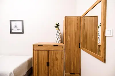a bathroom with a sink and a tub and a mirror at Family AC apartment Old Town Main Railway Station in Kraków