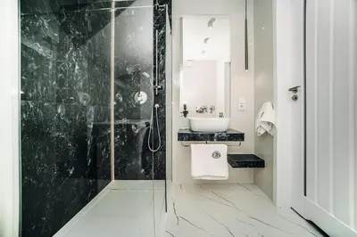a bathroom with a shower and a sink at Jurajski Zakątek in Skała