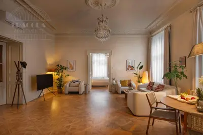 a large living room with couches and a table at Fragola Apartments Le Jardin - classy, spacious Old Town apartments in Kraków