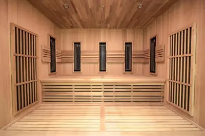 an empty gymnasium with a row of seats in a building at Apartamenty pod Jagnięciem - Rynek Główny in Kraków