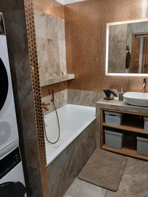 a bathroom with a tub and a sink at Cracow Stay Inn Home in Kraków