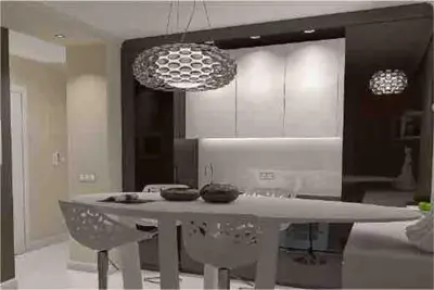 a kitchen with a white table with chairs and a kitchen at Family Modern apartment 35m2-for Max 5 persons in Kraków