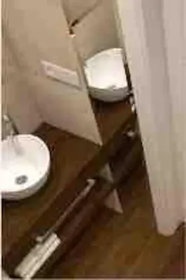 a bathroom with a sink and a toilet at Family Modern apartment 35m2-for Max 5 persons in Kraków