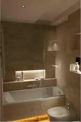 a bathroom with a tub and a toilet and a mirror at Family Modern apartment 35m2-for Max 5 persons in Kraków