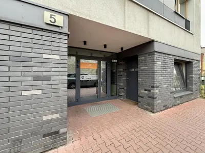 a building with the number on the side of it at Halicka Apartment Free Parking by CityBeat in Kraków