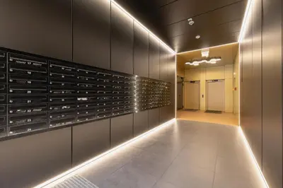 a wine cellar with a wall of wine racks at Przestronny Apartament z Balkonem by Noclegi Renters in Kraków