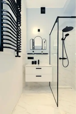 a bathroom with a sink and a shower at Roomy apartments Łobzowska Street in Kraków