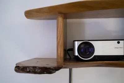 a microwave sitting on a wooden shelf at Old Town Parkview Apartment in Kraków
