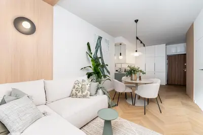a kitchen with a sink and a counter with bread at Smoleńsk by Tyzenhauz in Kraków