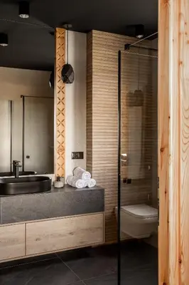 a bathroom with a sink and a toilet and a shower at Mokosz in PyzÃ³wka