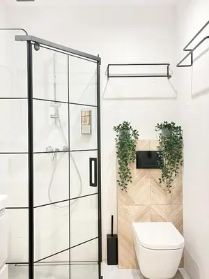 a bathroom with a shower and a toilet at Comfy Apartment with home cinema projector, Cracow's heart in Kraków