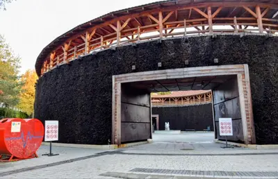 a large brick building with a large door at Salt Mine Apartment Bochnia by OTH in Bochnia