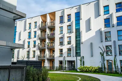 an apartment building with balconies on the side of it at K&M Apartments Near Tauron Arena in Kraków