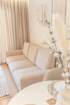 a living room with a couch and a table at K&M Apartments Near Tauron Arena in Kraków