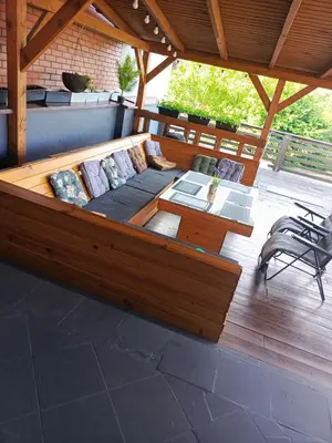 a large wooden boat sitting on a deck at Apartament U ELI z prywatnym tarasem in Oświęcim