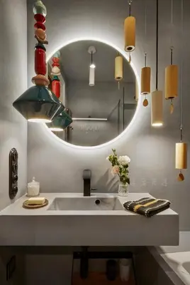a bathroom with a sink and a mirror at Luella in Kraków