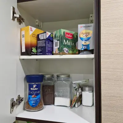 a pantry with food items on a shelf at Na Podwalu in Jaworzno