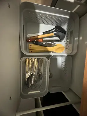 a drawer full of utensils in a refrigerator at Mieszkaj u Marty stale na Stałym in Jaworzno