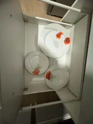 twoartments of a refrigerator with two lady bugs in it at Mieszkaj u Marty stale na Stałym in Jaworzno