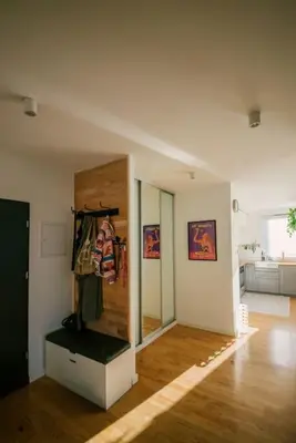 a room with a room with a closet in it at Stylowy Apartament Eden-Arena in Kraków