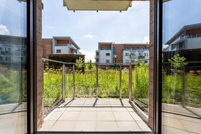 a view of an apartment complex from a balcony at Dębniki Pleasant Studio by BookingHost in Kraków