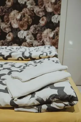 a living room with a couch and a dog on the wall at GRAND COMFORT 3 Bedroom, 3 Bathroom, Ground Floor&Fresh Air in Kraków