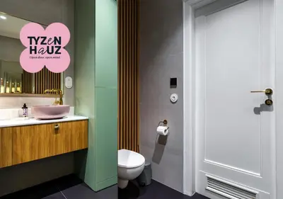 a bathroom with a toilet and a sink and a mirror at Wenecja by Tyzenhauz in Kraków
