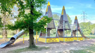 a park with a playground with a slide at RoseKrak in Kraków