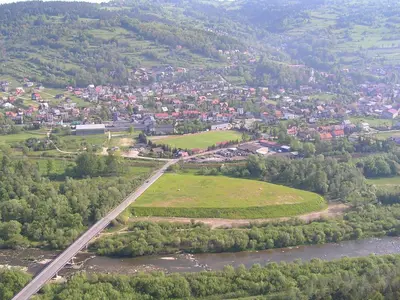 an aerial view of a town and a river with a bridge at Willa Świt in Maków Podhalański