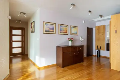 a dining room with a table and chairs at BIG Prestige Apartment - 6 min Main Square Kraków in Kraków