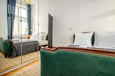 a bathroom with a bowl sink on a table at InPoint Royal Wawel View & Old Town Apartment Self Check-in in Kraków