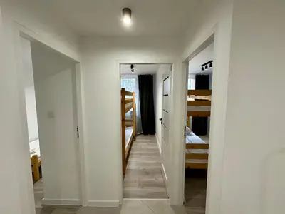 a living room with a couch and a table at Apartament Powstańców 17 in Oświęcim
